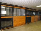 Multiple Welded horse stall fronts with mesh v-door and feed opening