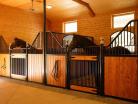 Horses enjoying their new Custom Tuscany Stalls with feed openings