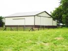 Brown Flex Fence® - A Wider Look In Front of the Barn