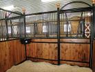 Inside of a nobleman stall with v-door and corner feeder