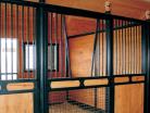 Close up view of a Nobleman horse stall with v-door and mesh bottom