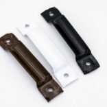 a trio of brackets. one brown, one white and one black