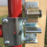 gate latch mechanism attached to red gate