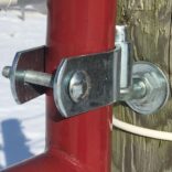 3/4 close-up image of gate line attached to a red tube gate