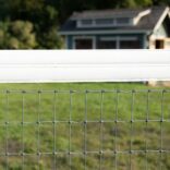 Galvanized Mesh Fence with a vinyl top rail