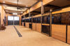 line of Oxford stalls in a new stable construction
