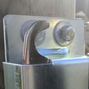 lag bolts installed on a 2-way latch