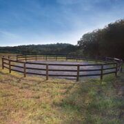 a round horse pen constructed of 525 Flex Fence