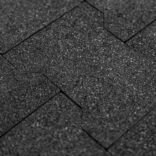 close up of black rubber pavers