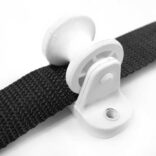 image of webbing running through an insulator