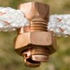 copper bolt shown in use with braided electric fence
