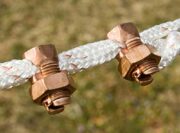 copper bolt shown in use with braided electric fence
