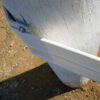 detail of end plate attached to post from above
