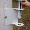 white tightener with hand showing support