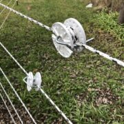 tightener strung with white and black braided electric rope