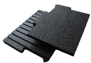 Interlocking horse stall mats with etched top surface