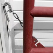 chain latch gate installed between gate and barn