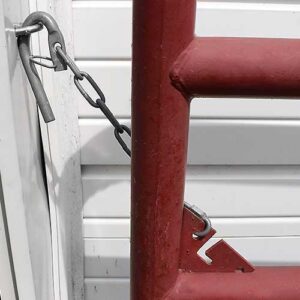 chain latch gate installed between gate and barn