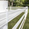 white line post brackets installed on white posts