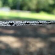 a single strand of white and black braided electric fencing