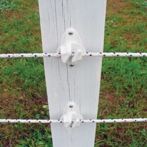 white and black braided electric fencing installed on a white fence post