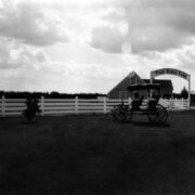 white fence on a ranch