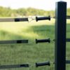 3 black electric gate handles connected to 3 rails of electric tape