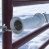 closeup of a white electric gate handle