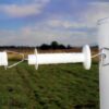 closeup of a white electric gate handle