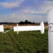 closeup of a white electric gate handle