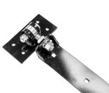 closeup on an end angle of heavy-duty black metal barn door hinge