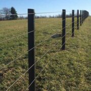 a 4 rail fence constructed of coated wire