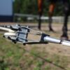 Inline fence tensioner installed on high tensile wire