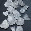 Moisture Lok Dust Control white or clear crystals against a gray background