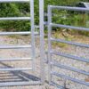 galvanized round pen with gate and kicker leg